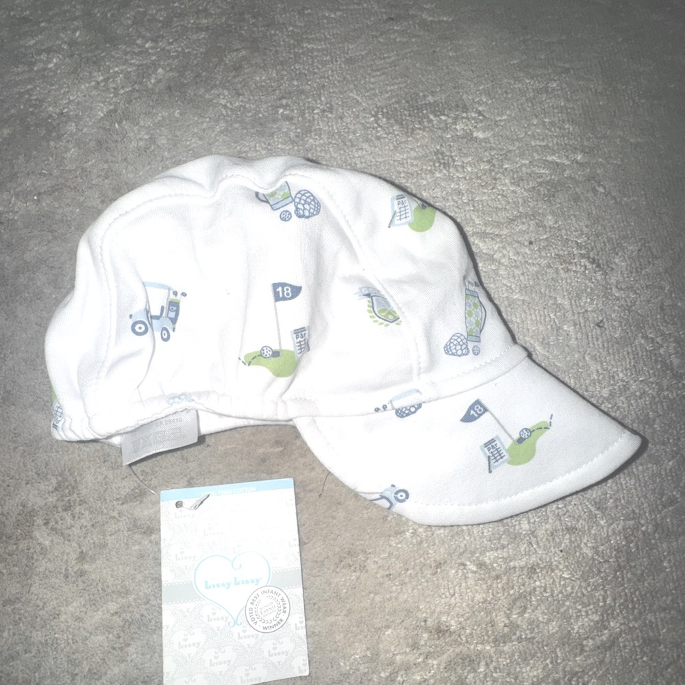 NWT kissy kissy baby cap hat. Size SMALL, Style “18 holes”